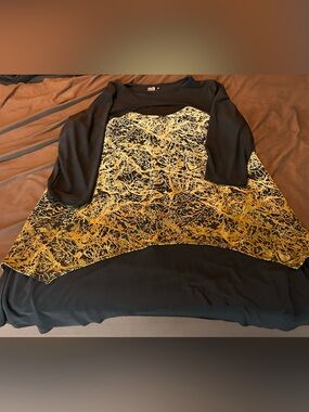 Plus-Size Black Tunic with Gold Abstract Panel